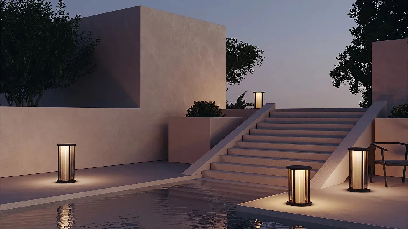 A stunning pool with a softly lit staircase invitingly descending into the water, enhancing the peaceful ambiance of the scene.